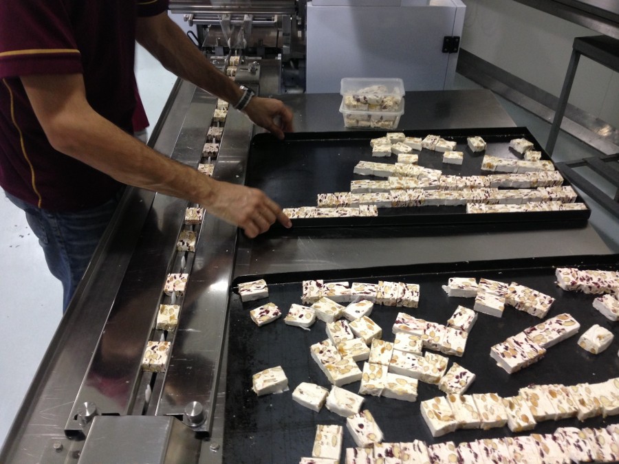 Andrea assembling the nougat to be packaged